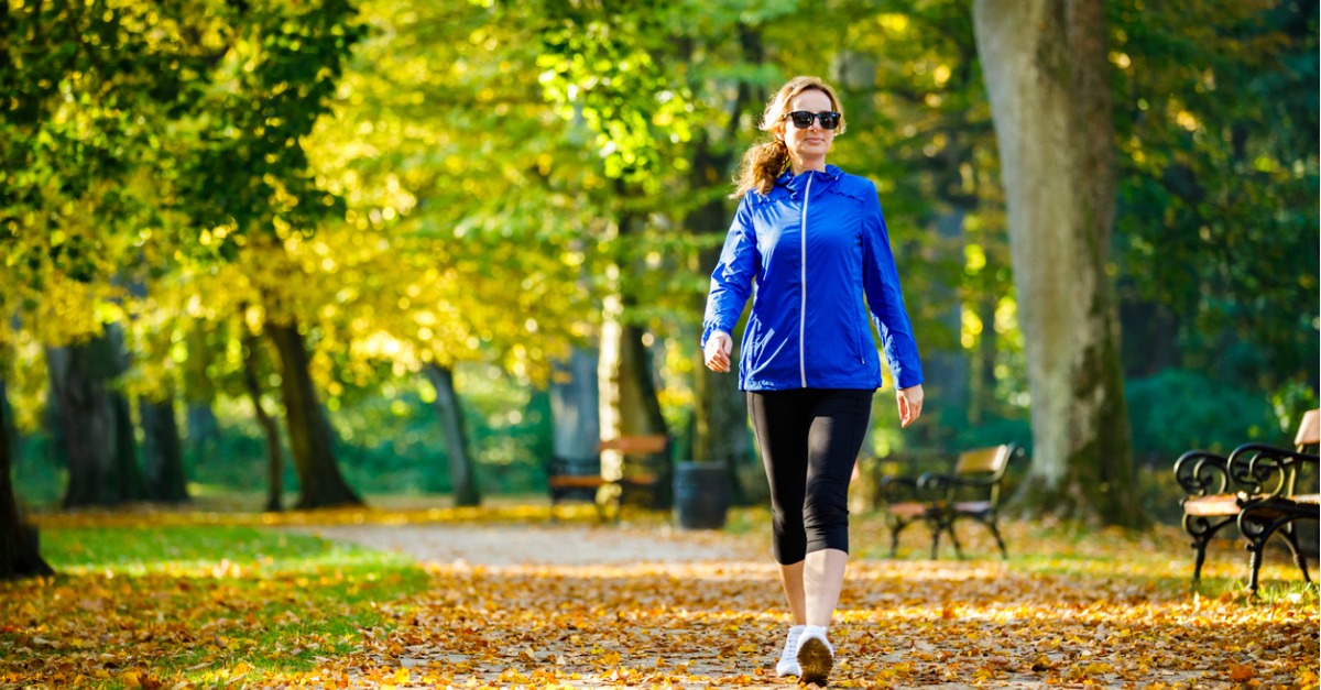 mid-aged-woman-running-in-city-park