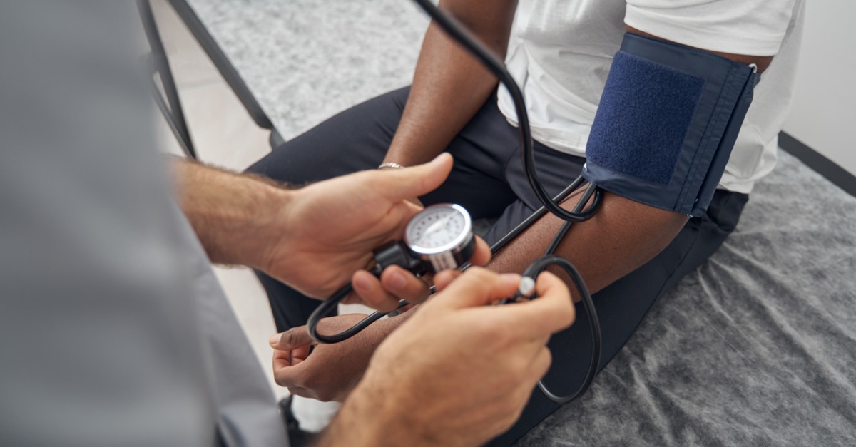 african-american-having-blood-pressure-measured-by-provider
