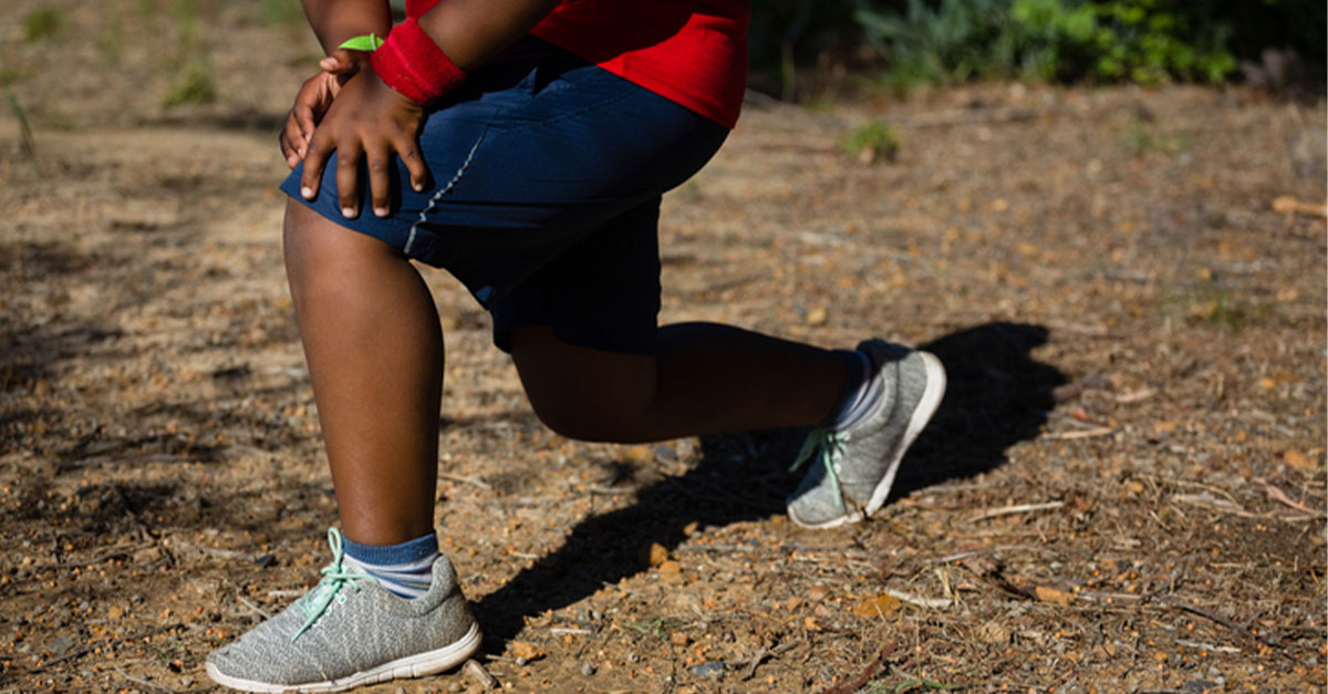 Overweight child exercising